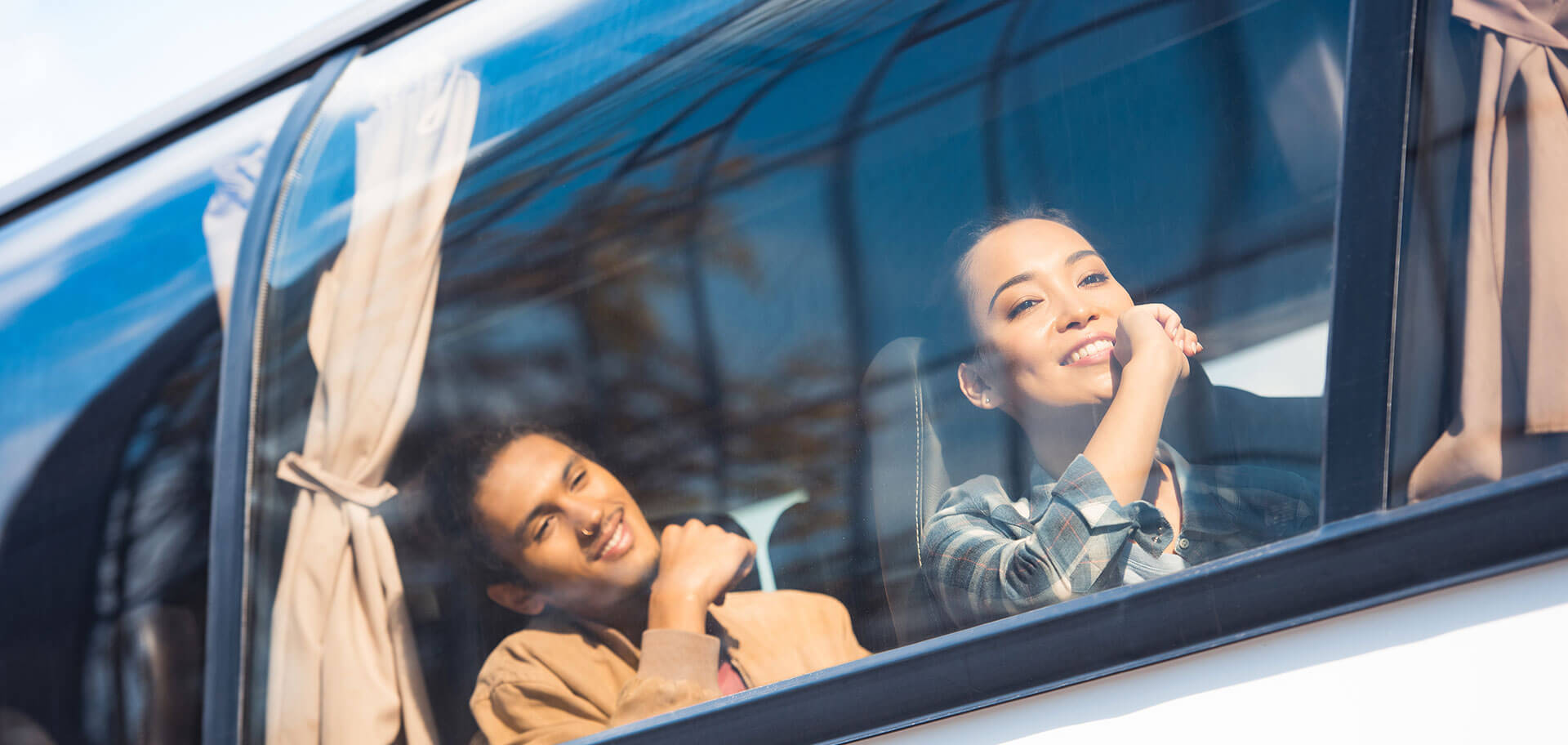 PrivateCharterBusWindowandPassengers Bus Hire, Coach Hire